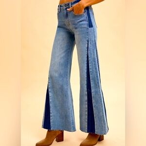 Vintage 70's look flare leg jean in a two tone wash and a high rise